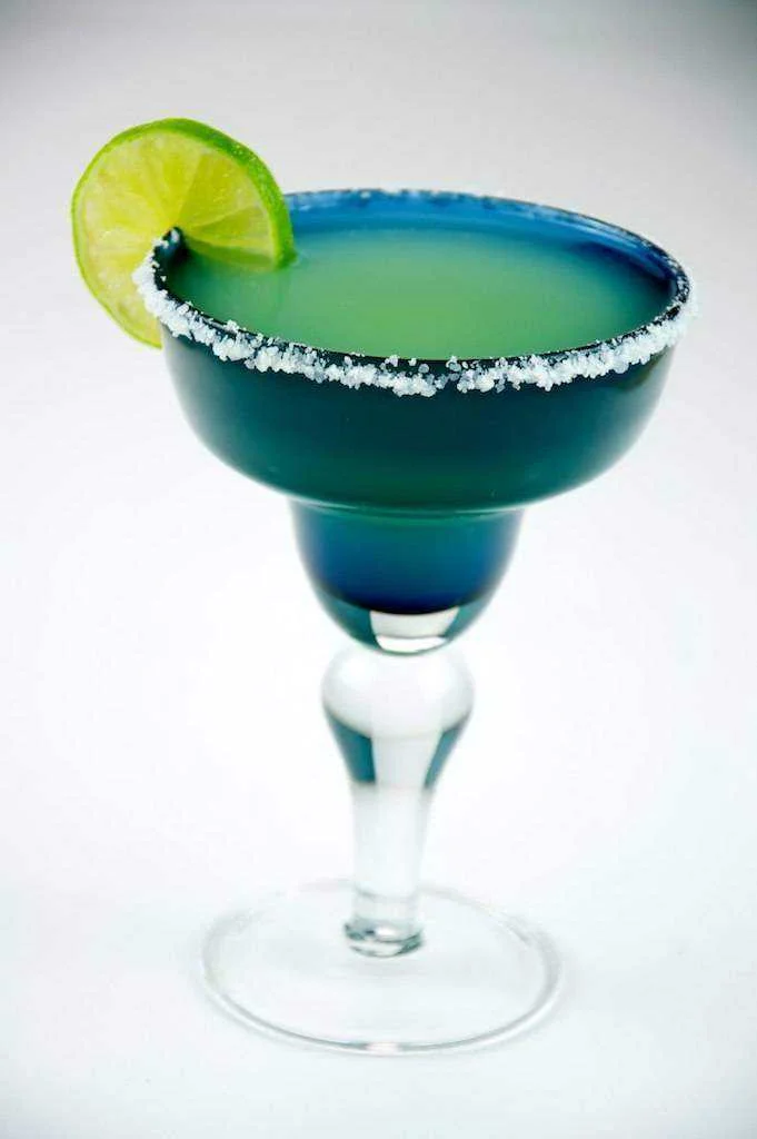 rita_with_lime_in_a_margarita_glass_-_Evan_Swigart.webp