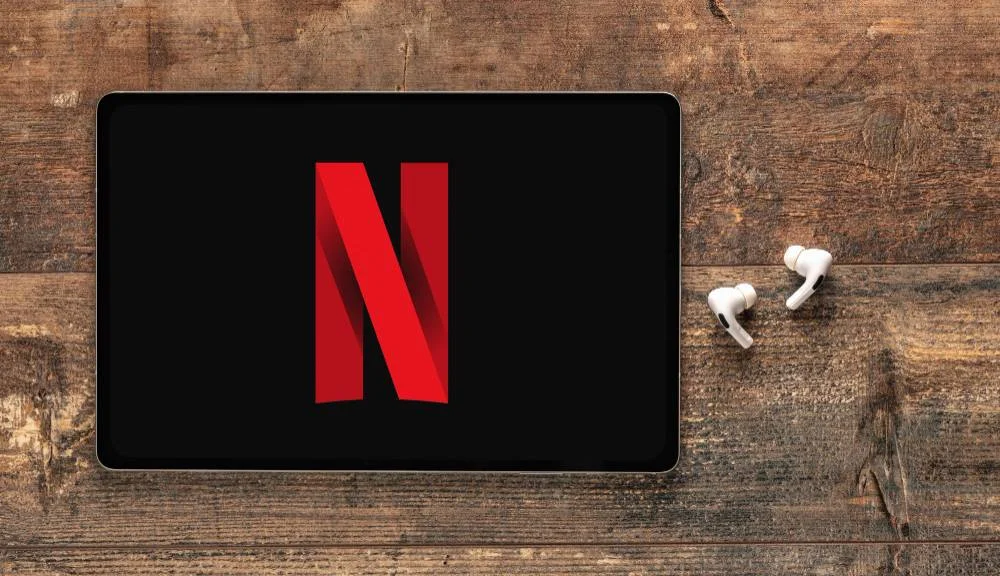 new-york-usa-november-25-2022-netflix-logo-apple-ipad-earphones-netflix-is-global-provider-str...jpg