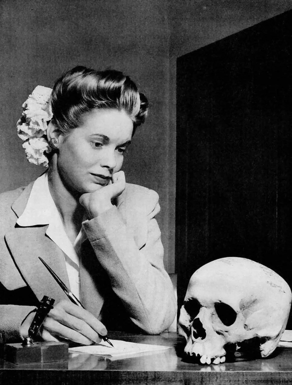 A woman writing a thank you note to her boyfriend in the Navy for the skull of a Japanese soldier that he sent her, 1944.