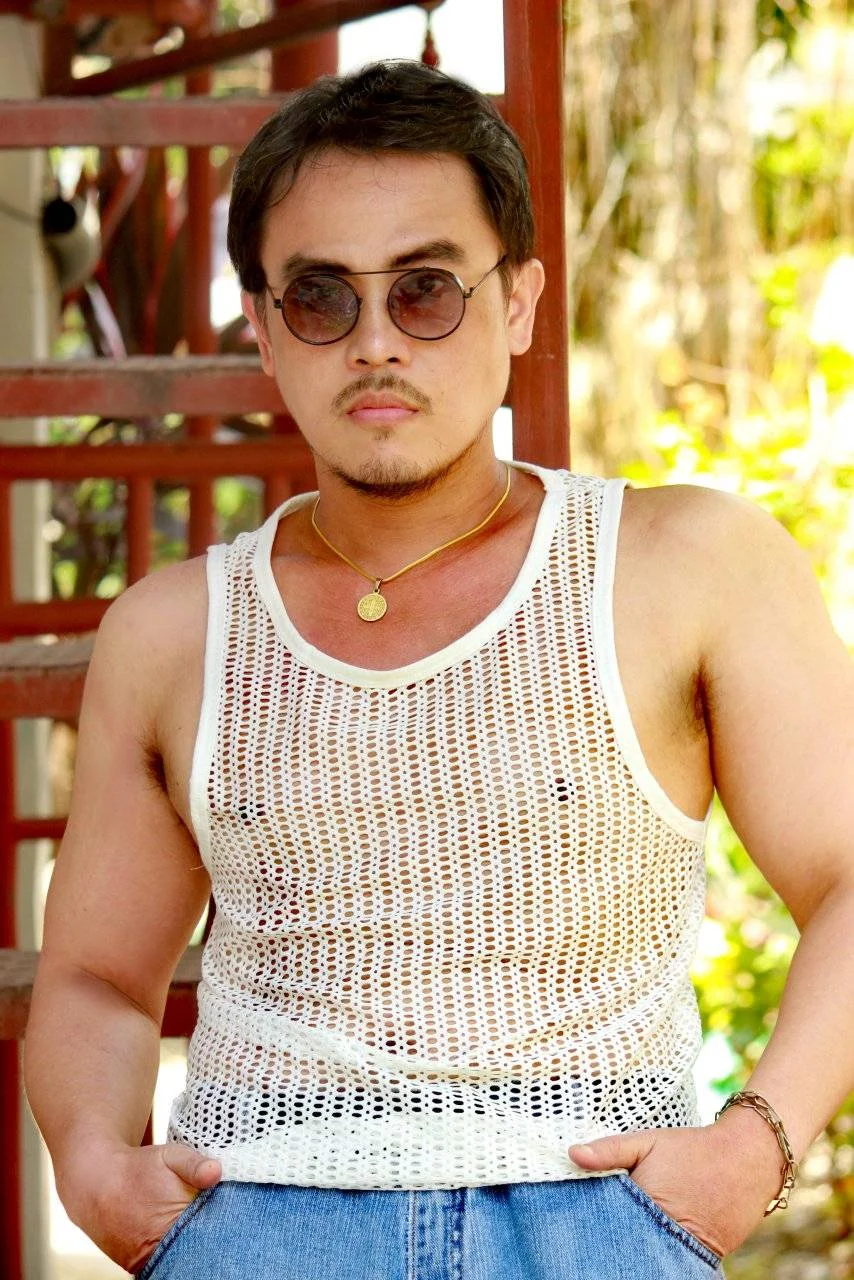 Rod Maceda blue jeans white sando muscles macho Pinoy man.webp