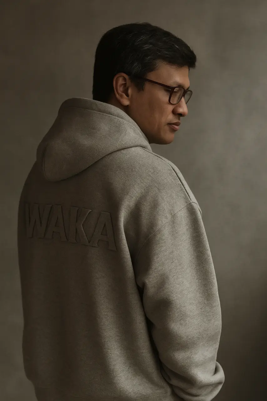 20250708_1905_WAKA Hoodie Editorial_remix_01jzmvaczcfnv8are5xej7bvfx.webp