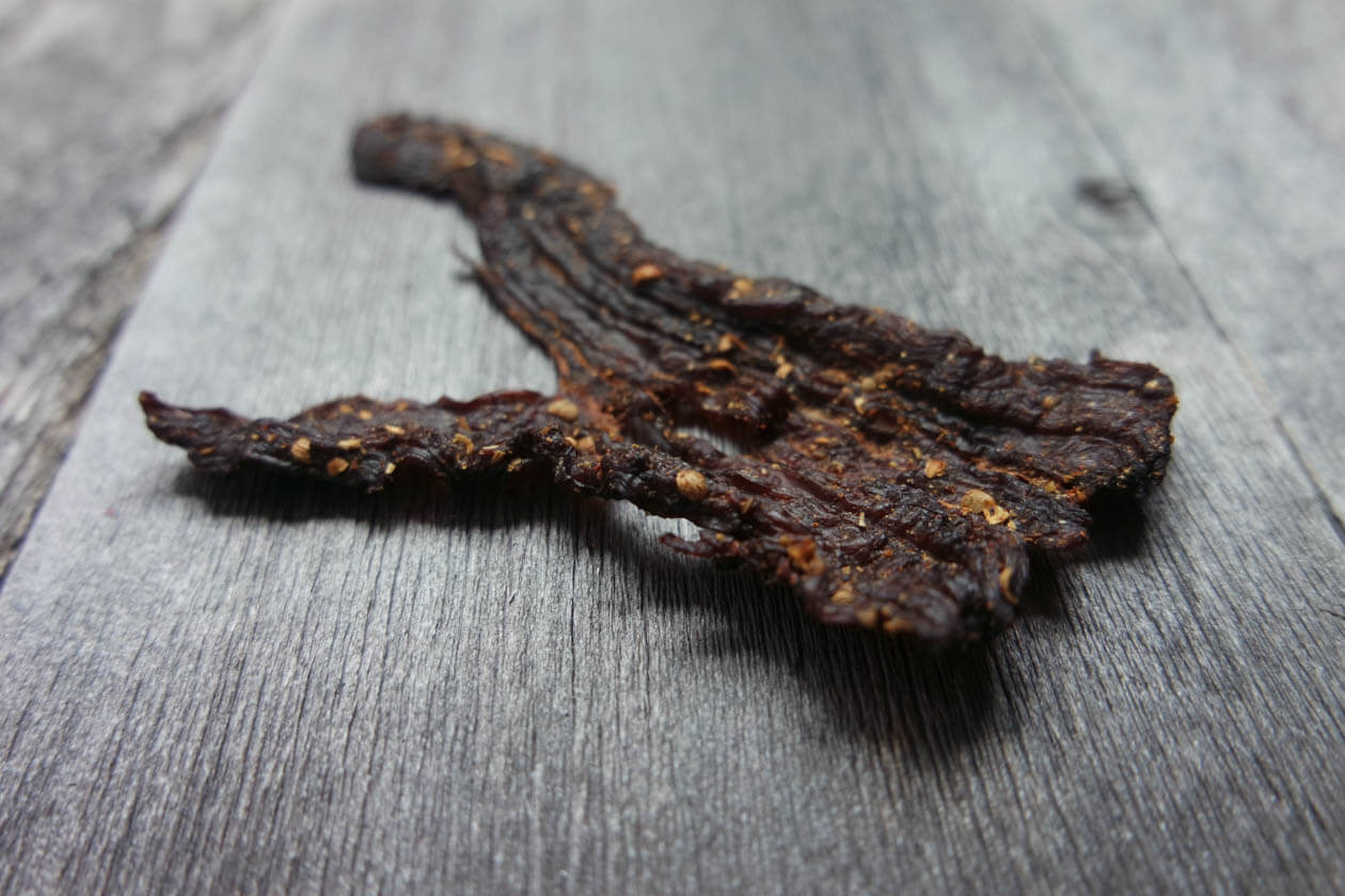 piece of beef jerky on wood